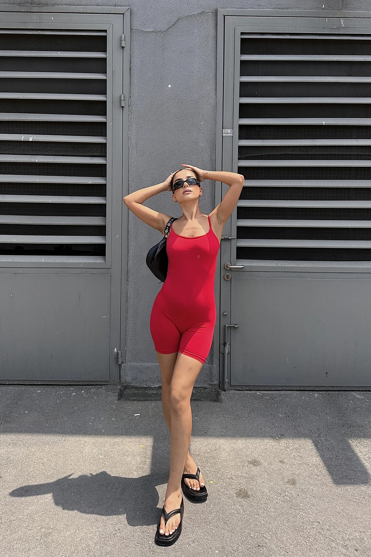 Basic jumpsuit with red strap